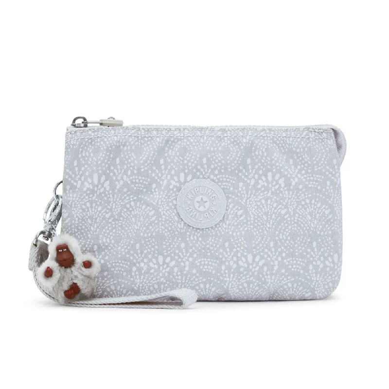 Leather luggage handles for a comfortable and stylish gripKipling Creativity XL Extra Large Printed Wristlet - Stellar Vision