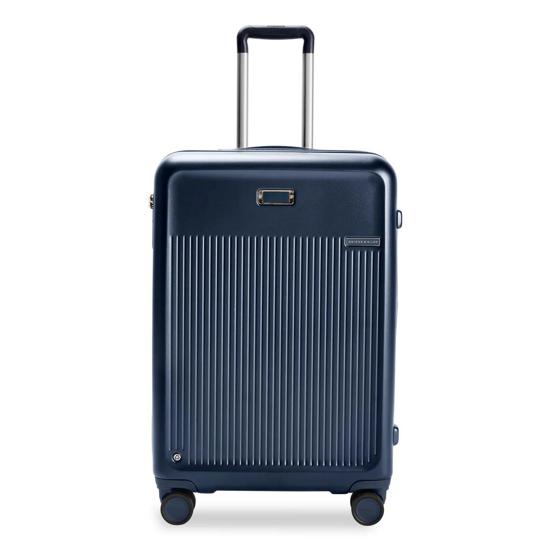 Expandable packing cubes sets in various sizes for organized suitcase packingSympatico Medium Expandable Spinner
