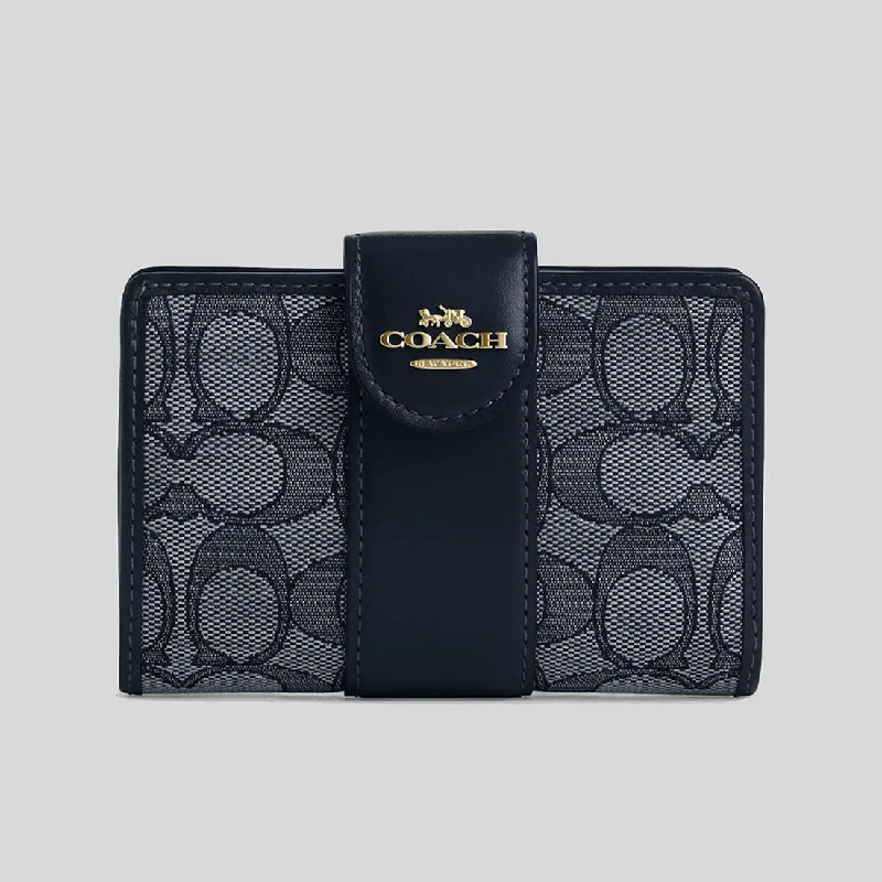Money clips vs traditional walletsCOACH Medium Corner Zip Wallet In Signature Jacquard Midnight Navy CU987