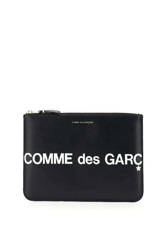 Eco-friendly money clips made from sustainable materialsComme Des Garcons Wallet Leather Pouch With Logo