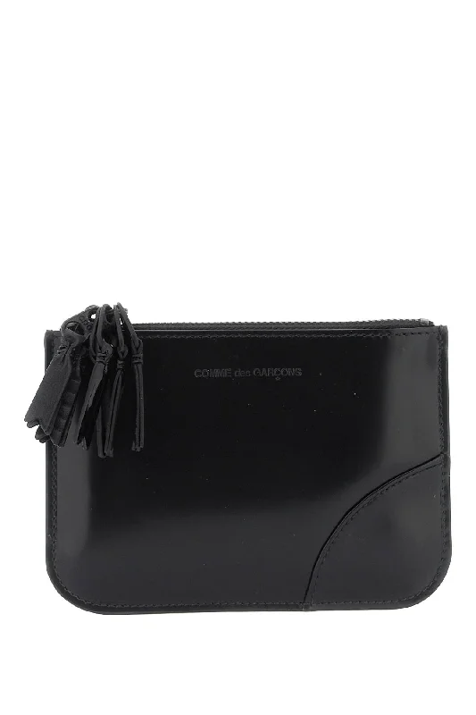 Eco-friendly money clips made from sustainable materialsComme Des Garcons Wallet Multi-Zip Wallet With