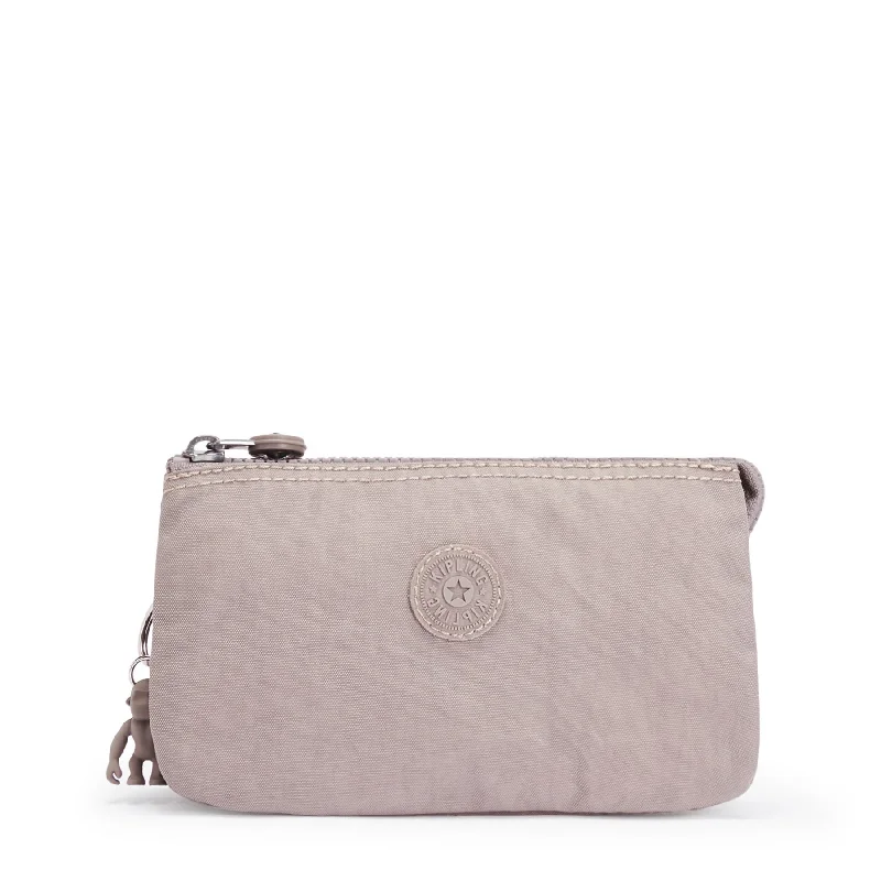 Vintage-style money clips for collectorsKipling Creativity L Pouch Purse in Grey Gris