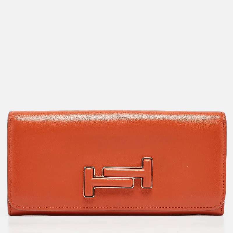 Tod's Burnt Orange Leather Flap Continental Wallet..