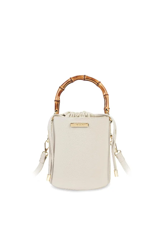 Military - style men's crossbody bag with MOLLE webbing for attachmentsKatie Loxton Jourdan Bamboo Handle Bucket Bag, Off White