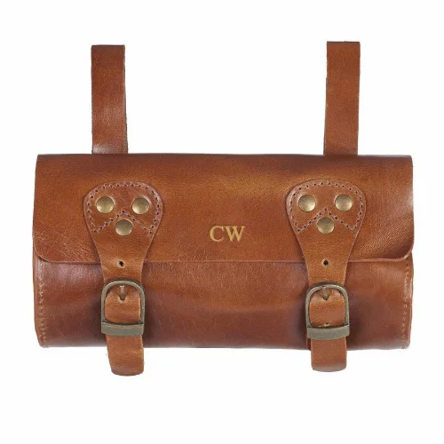 Rolling travel bag with adjustable telescopic handle for different user heightsLeather Bike Saddle Bag
