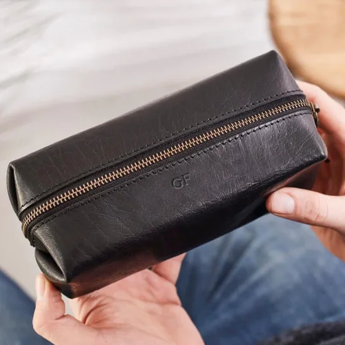 Foldable fabric travel bag for convenient storage when not in useLeather Shaving Bag and Razor Cover