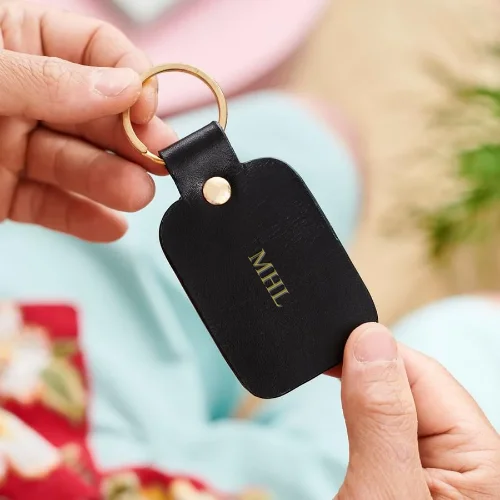 Expandable hard - shell polycarbonate travel bag for long - term international tripsLuxury Leather Key Ring
